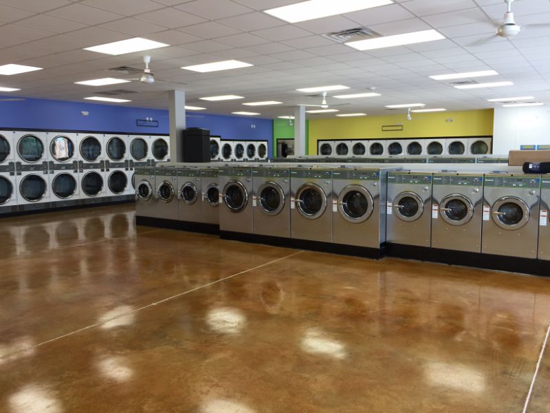 washer and dryers inside of a laundromat