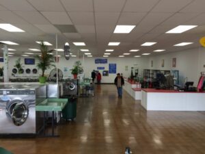 washer and dryers inside of a laundromat
