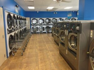 washer and dryers inside of a laundromat