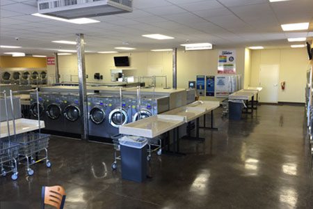 laundry mat with folding tables