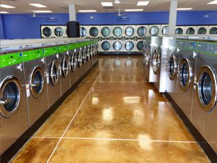 two rows of laundry machines
