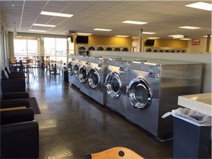 a row of laundry machines